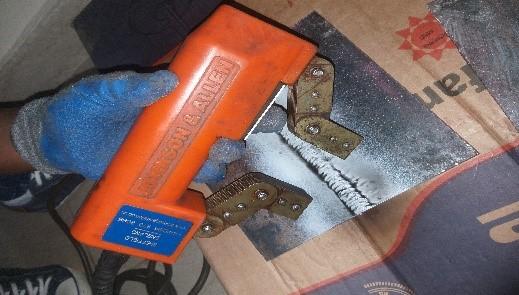 Magnetic Particle Testing (MPI) using electromagnetic yoke on weld toe with white contrast paint